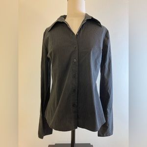 H&M women’s size 8 black pin stripe stretch blouse.